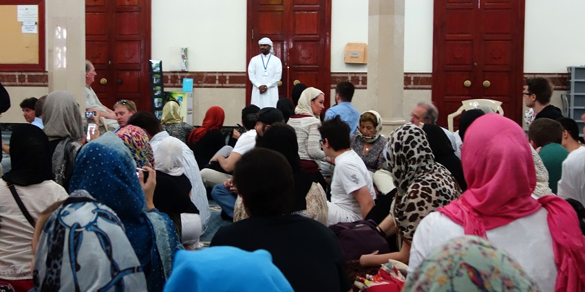 People covering their head at the mosque