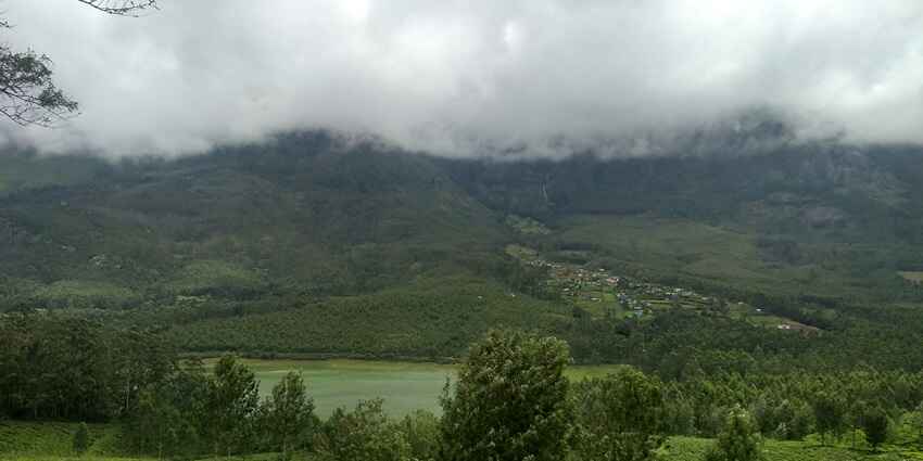 Visit Echo Point in Munnar for a beautiful experience of lush greenery and scenic views