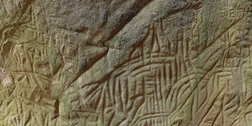 Carvings in Edakkal caves- one of the most secluded places to visit in Kerala in September