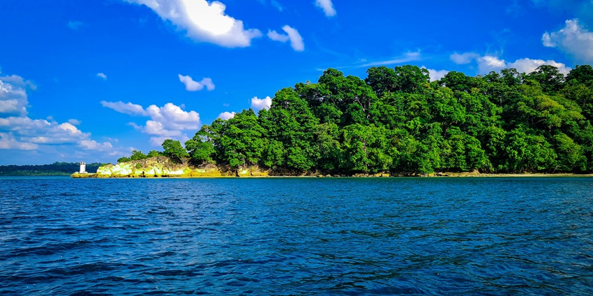 The crystal-clear waters of Elephant Beach, Havelock Island is home to sea turtles and reef sharks