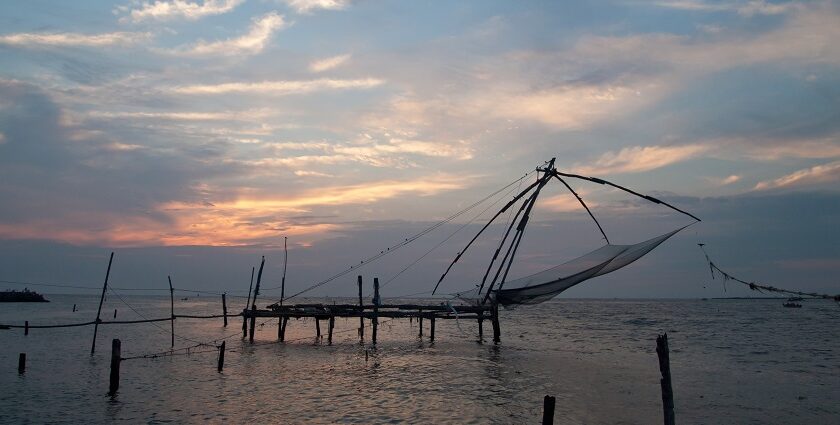 The fishing nets at Kochi during the sunset makes for a picturesque and scenic view