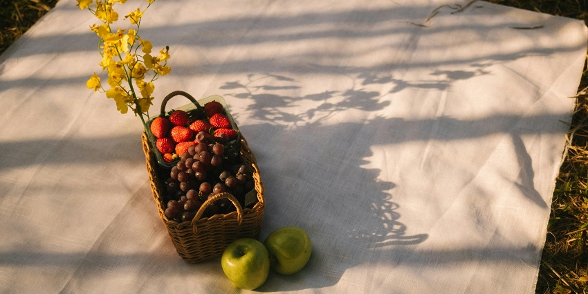 Basket of Fruit on White Cloth - enjoy with your family and friends in Vilangad waterfalls