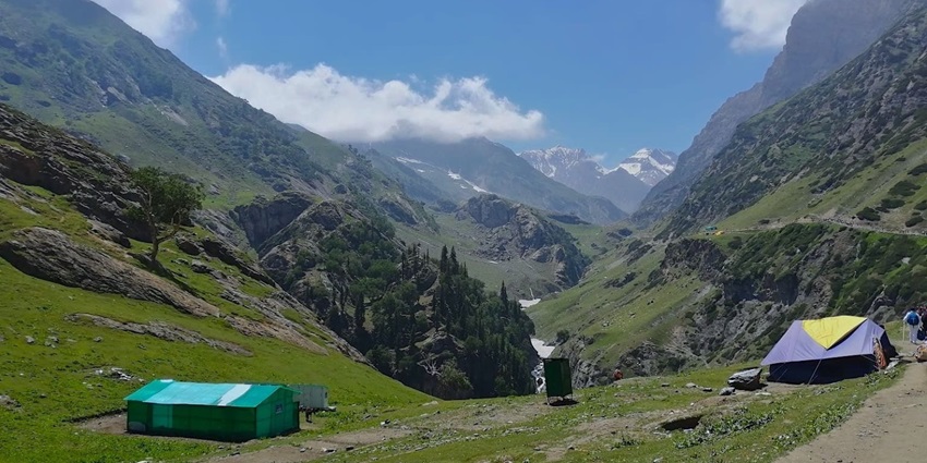 Tents pitched at a camping ground in Pissu Top along the Shehsnag Trek, Kashmir highlands