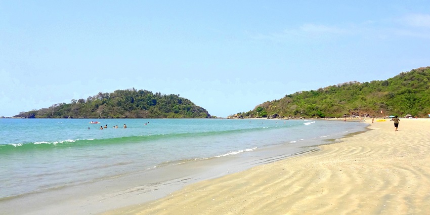 View of Goa Beach, clear water and blue sky - places to visit in Monsoon in India