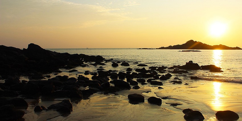 Sunset on the Om Beach, Gokarna, which is one of the places to visit in November in India