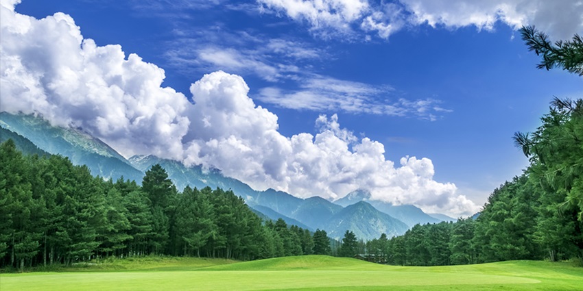 The view of Pahalgam Golf Course with mountains in background, Jammu and Kashmir, India