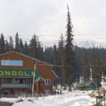 Gondola spot amidst snow-capped peaks, one of the places to visit in Gulmarg in December