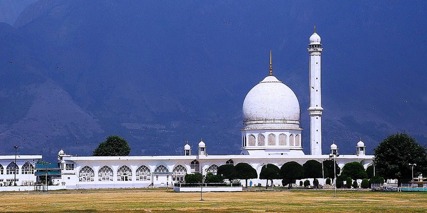 The view of majestic Hazratbal Shrine, reflecting in the waters of Dal Lake, Kashmir.