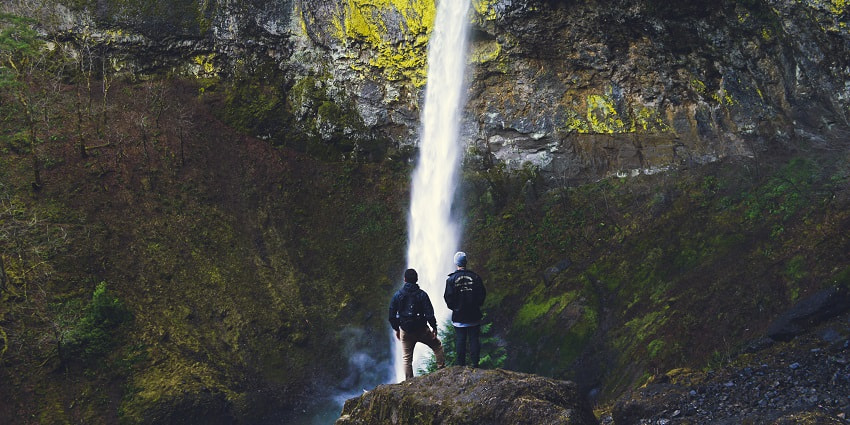 Travellers hiking near the waterfalls and enjoying in nature - Vilangad Village