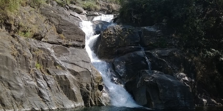 The waterfall is located approximately 45 kilometers from the city of Thiruvananthapuram.