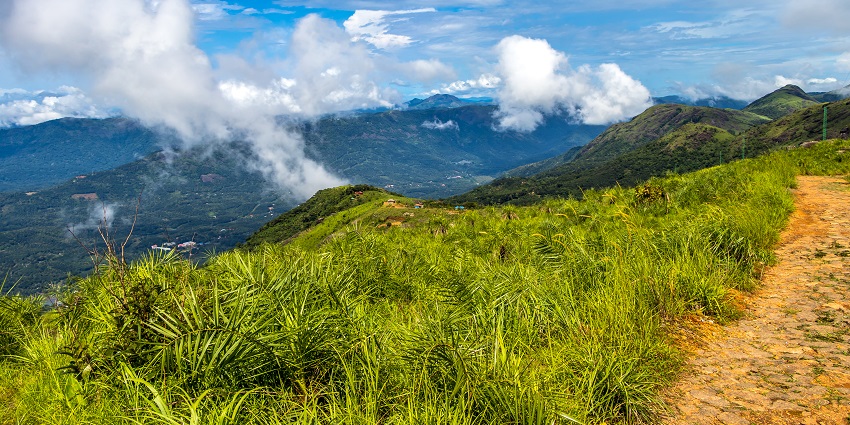 Trek in the scenic hills and take breathtaking pictures of the green lush hills and falls