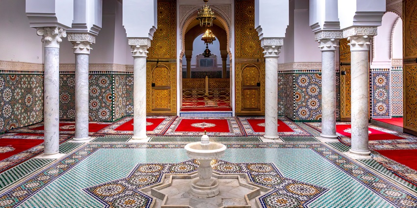 Interiors of the Malik Deenar Mosque display highly rich architecture with intricate displays.
