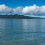 A beautiful view of clear blue water and mesmerising clouds in Rutland Island.