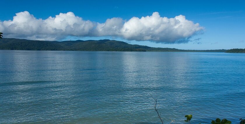 A beautiful view of clear blue water and mesmerising clouds in Rutland Island.