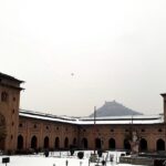 A serene view of the Jamia Masjid with its lofty entrance in the backdrop of winter.