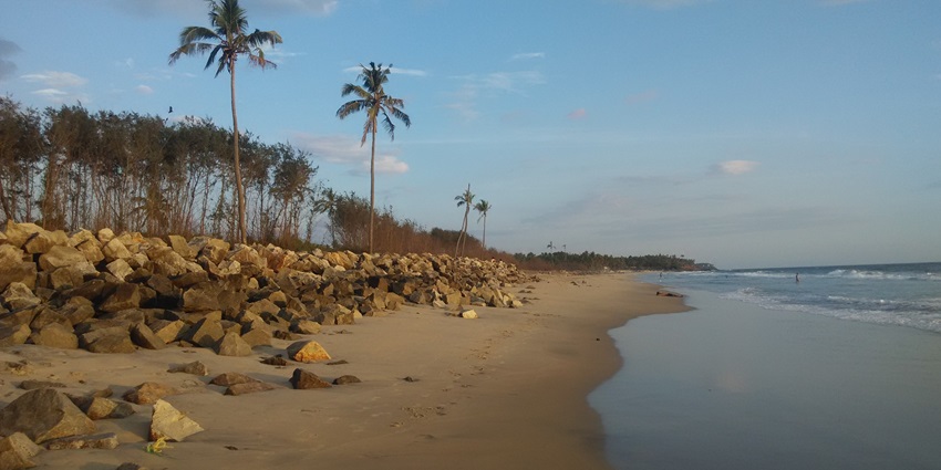 Serene Beach, featuring tranquil waters and green surroundings - places to visit in Bekal