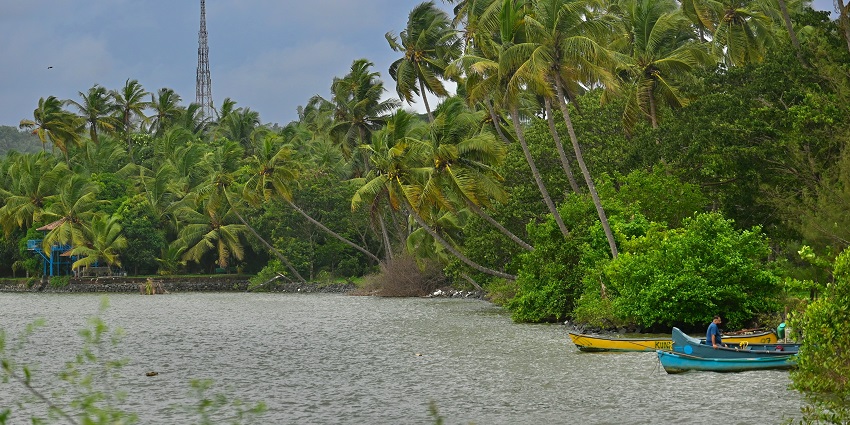 Boats at the Chandragiri River in Kasaragod, one of the places to visit in South India