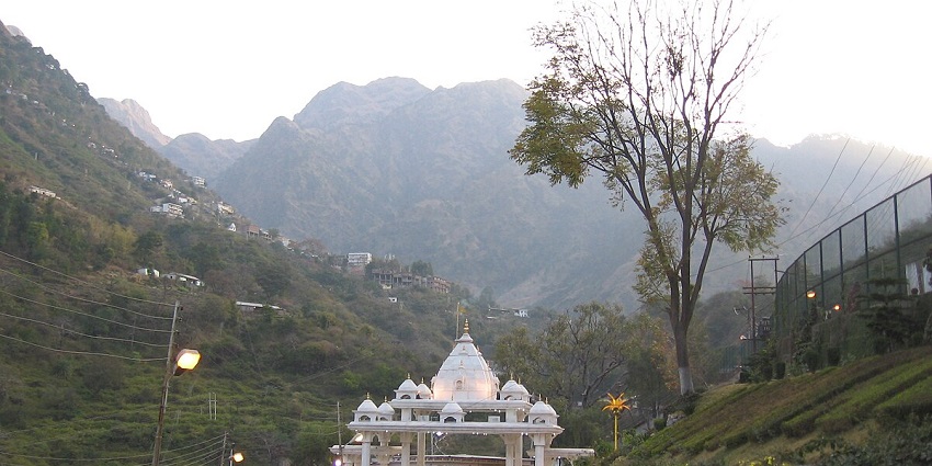 The entry gate of the Vaishno Devi Temple at Katra with a mesmerising backdrop of mountains