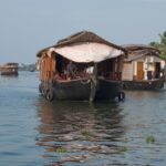 Soothing boat ride on the backwaters of Kerala - Best places to visit in Kerala in August