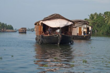 Soothing boat ride on the backwaters of Kerala - Best places to visit in Kerala in August