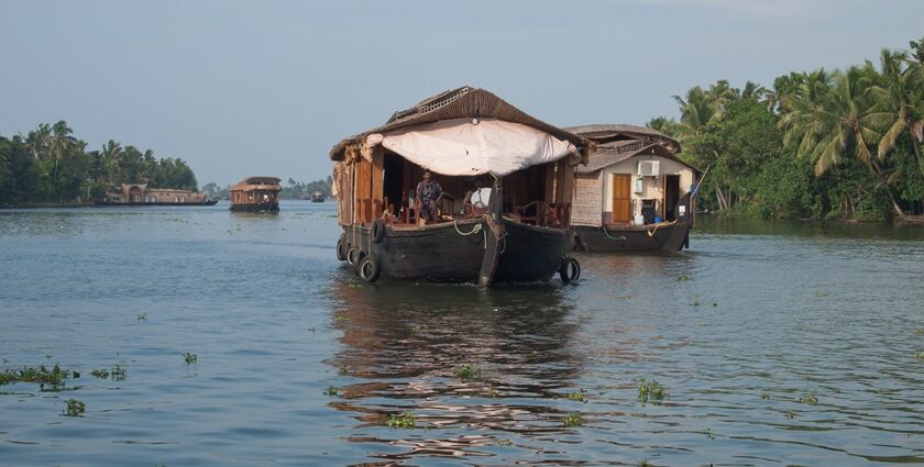 Soothing boat ride on the backwaters of Kerala - Best places to visit in Kerala in August