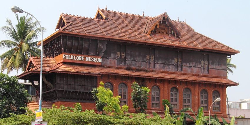 Kerala Folklore museum view - explore the wooden sculptures, paintings, pottery.