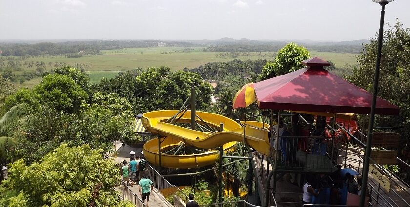 People enjoying slides in a water park