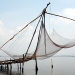 The view of Chinese fishing nets at one of the places to visit in Kochi, Kerala, India.