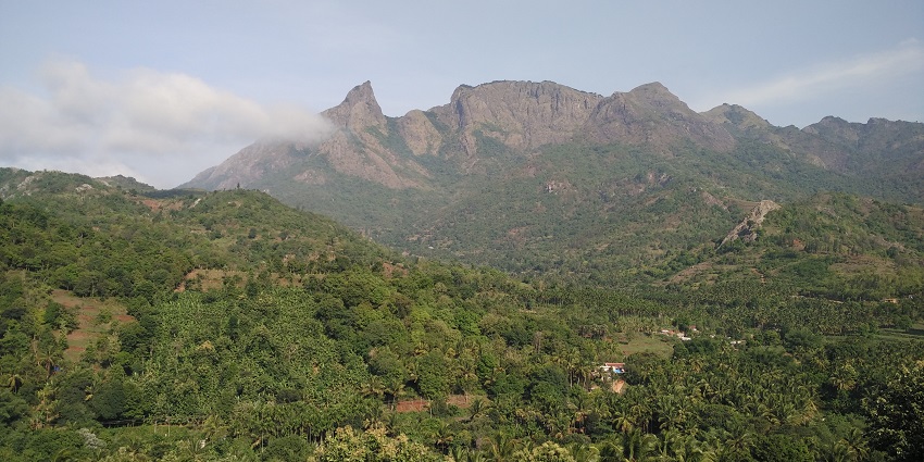 Witness the breathtaking views from the serene Kottancheri Hills in Kerala, India.