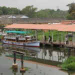 A boat jetty at Kottayam in Kerala with the backdrop of lush green landscapes