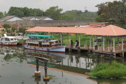 A boat jetty at Kottayam in Kerala with the backdrop of lush green landscapes