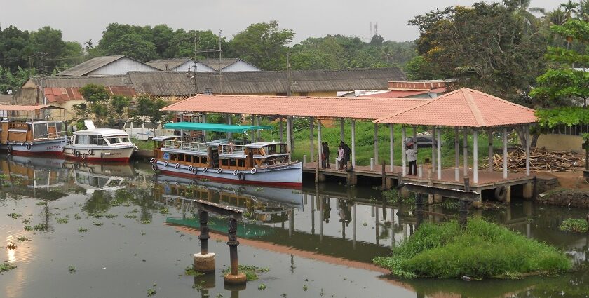 A boat jetty at Kottayam in Kerala with the backdrop of lush green landscapes