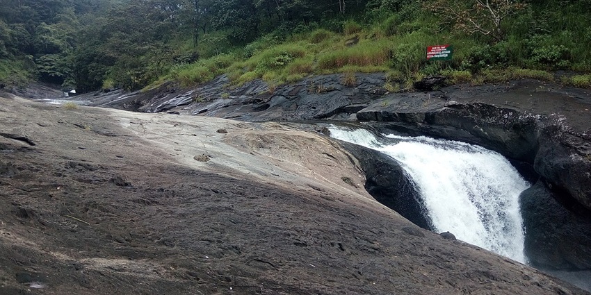 Hike to the beautiful Kozhippara Waterfalls - one of the best things to do in Kozhikode.