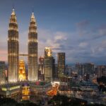 Dazzling skyline with illuminated skyscrapers - places to visit near Kuala Lumpur