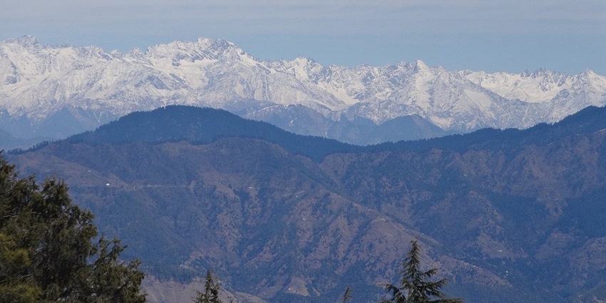 Hills of Kufri overlooking Himalayas, one of the most scenic places to visit in Himachal in July