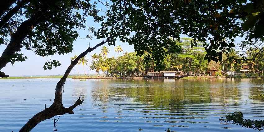 Boat on the Tranquil backwaters of Kumarakom one of the idyllic places in Kerala