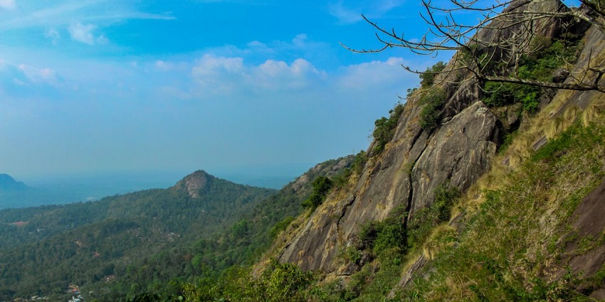 A hilltop at Kurumbalakotta Kurishu Mala, one of the top places to trek to in Wayanad