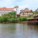 An aerial view of Ashtmudi in Kerala with azure waters all around with lush greenery.