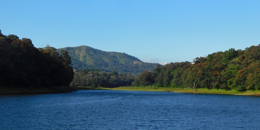 A panorama of mountains and Lake Periyar, in mesmerising Thekkady, Kerala, India.
