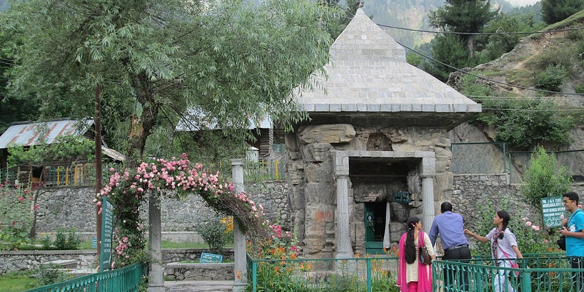 Image of Mamal temple also called Mamleshwar Temple surrounded by lush green mountains