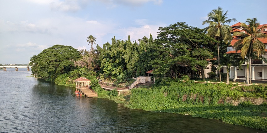 Stroll at the scenic Manappiram temple by the Periyar River in the beautiful city
