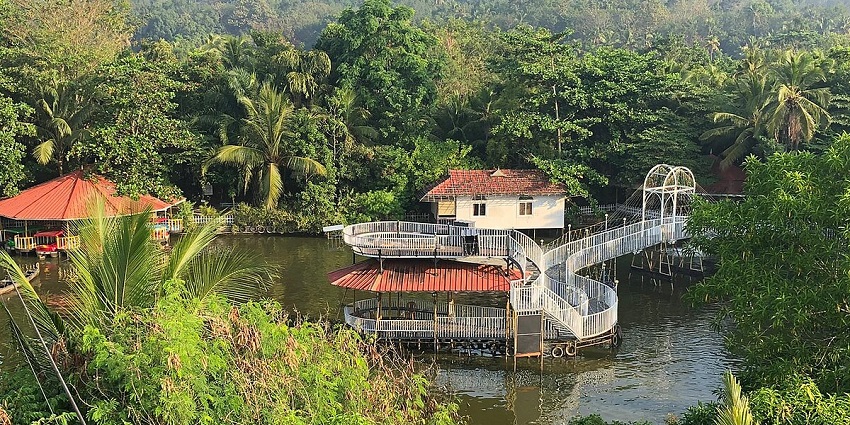 Visit Mango Meadows Agricultural Theme Park near Bay Island Driftwood Museum, Kumarakom.