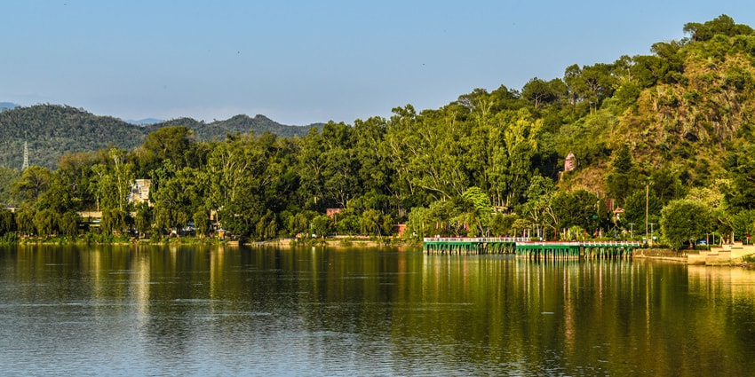 Stroll at the banks of Masar Lake amidst the green pine trees near the Akhnoor fort