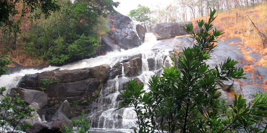 Trek the beautiful Meenmutty Falls and spend some time there near Sulthan Bathery