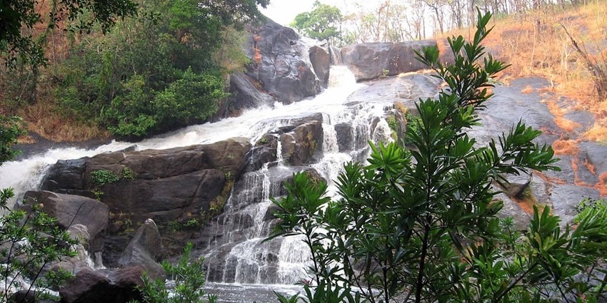 Witness the amazing Meenmutty Waterfalls located near Banasura Sagar Dam, India.