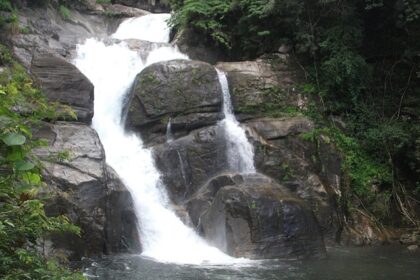 Water descending down Meenmutty Falls- one of the most serene places to visit in Wayanad