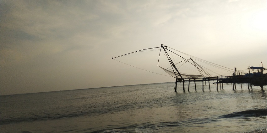 Capture the Chinese fishing nets at Munambam beach with its bustling fishing harbour