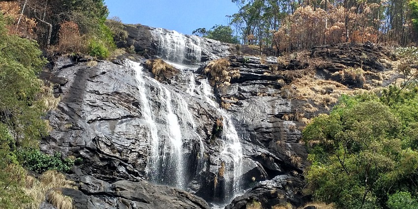 Water falling from the hill at one of the Ripple Waterfalls, Munnar, Kerala