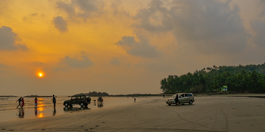 Relax at the serene beaches of Muzhappilangad Beach, near Kottiyoor Wildlife Sanctuary.