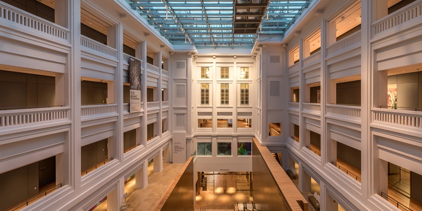 A picture of the interiors of the National Gallery Singapore showcasing its magnificent modern architecture